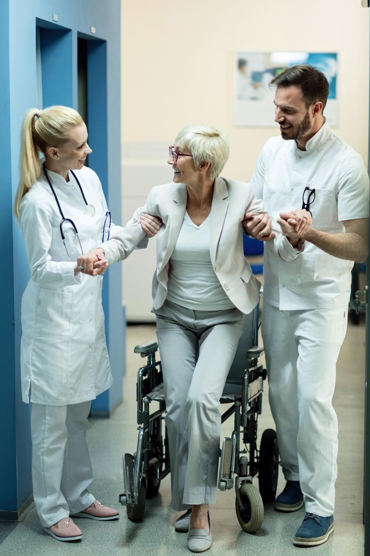 Care team helping a patient at ProHealth Clinic