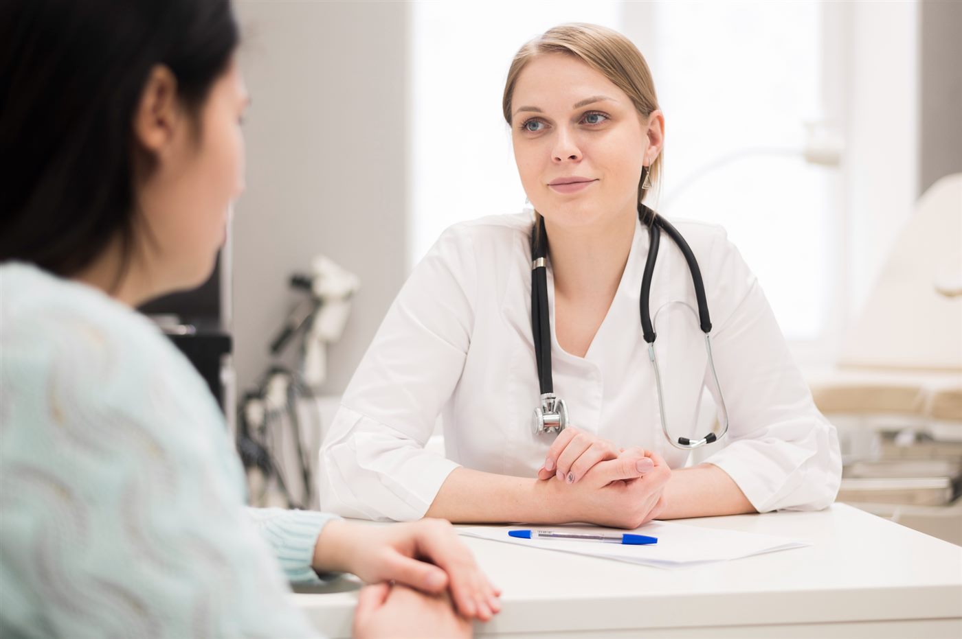 Doctor consulting with a patient at ProHealth Clinic